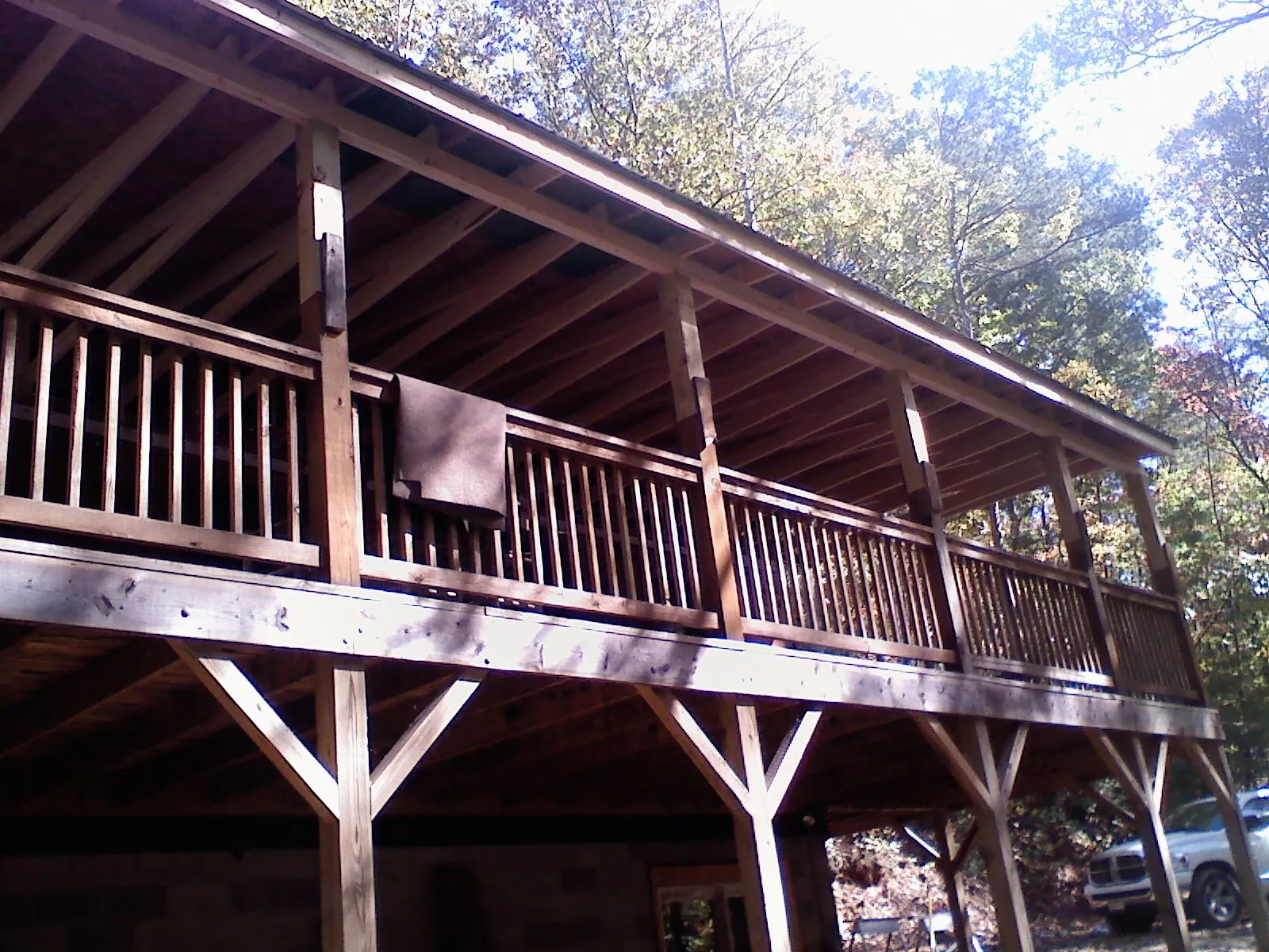 Timber framing under a new elevated porch and deck — Roof Leak Repair in Honey Grove by Roofing Brothers